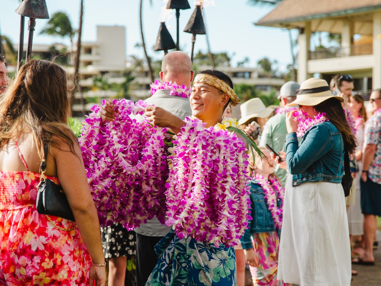 a group of people walking down the street