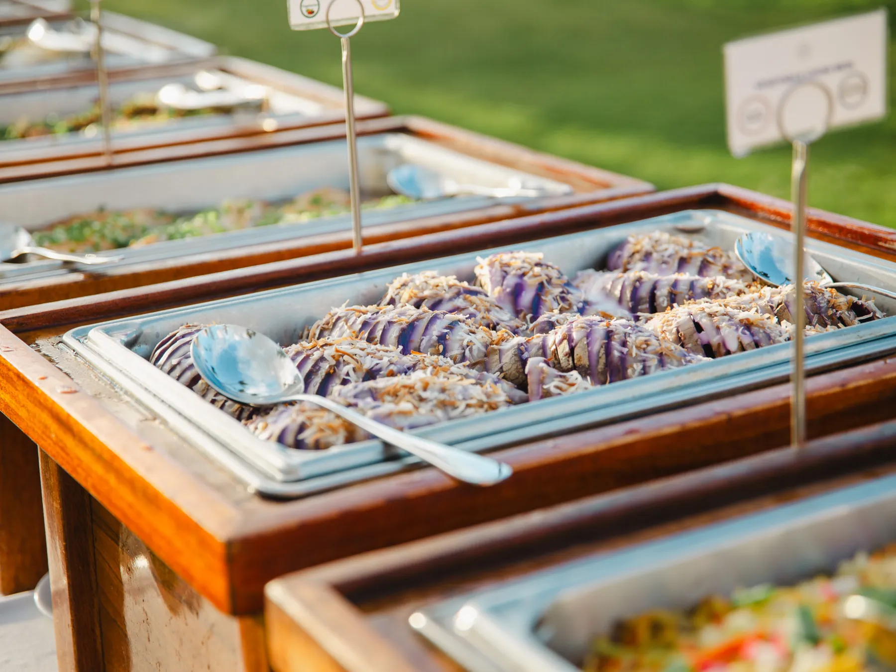 a pizza sitting on top of a wooden table