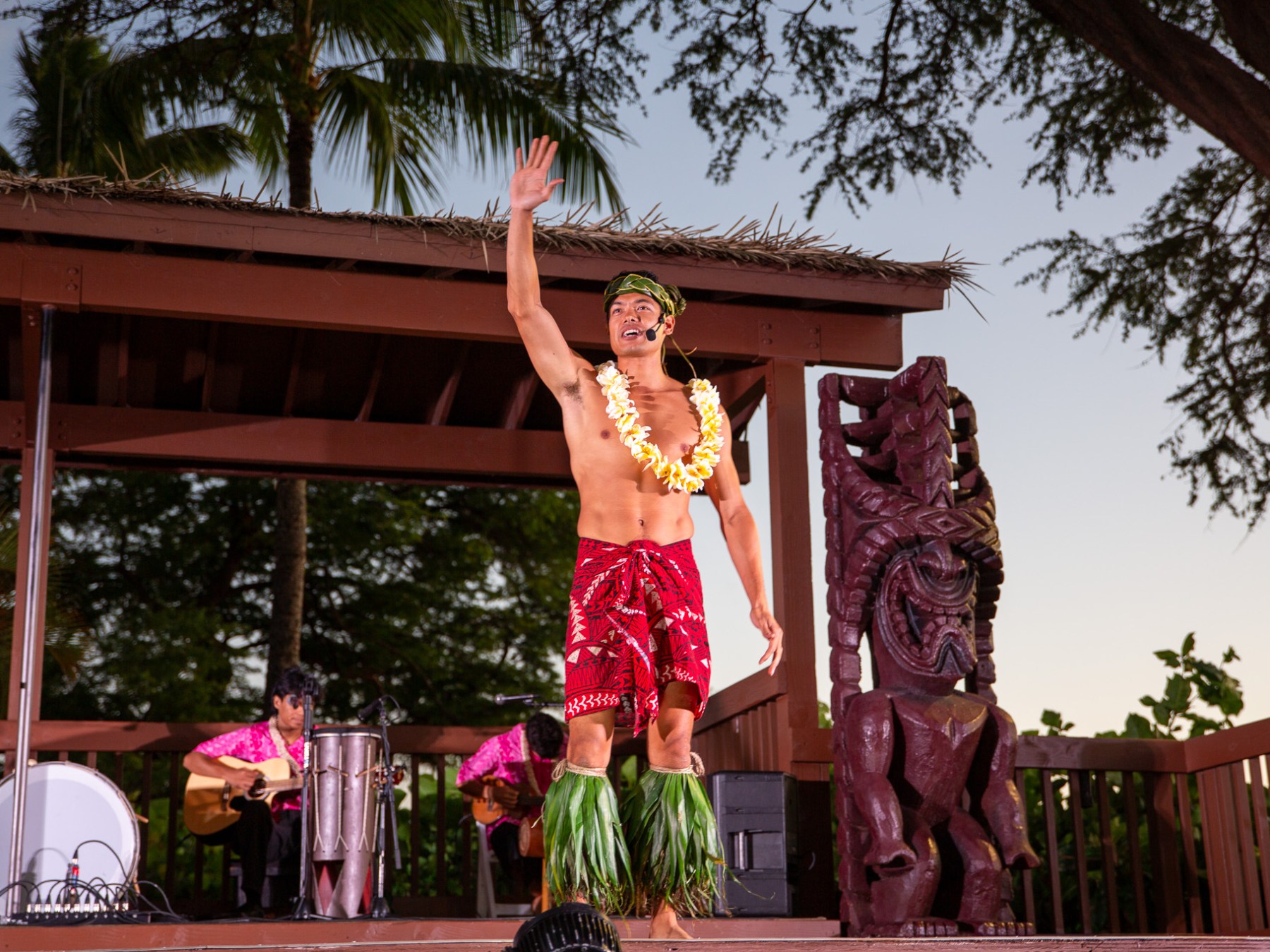 José Vidro standing in front of a statue