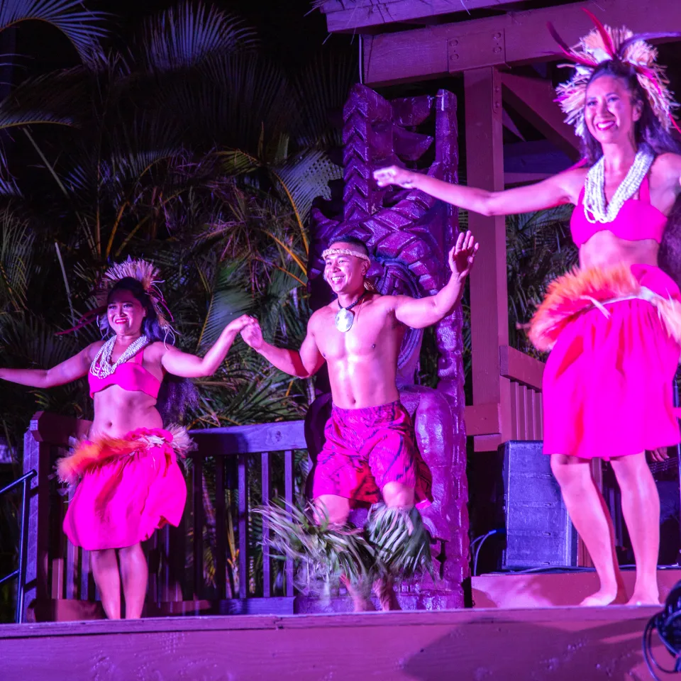 a little girl standing on a stage