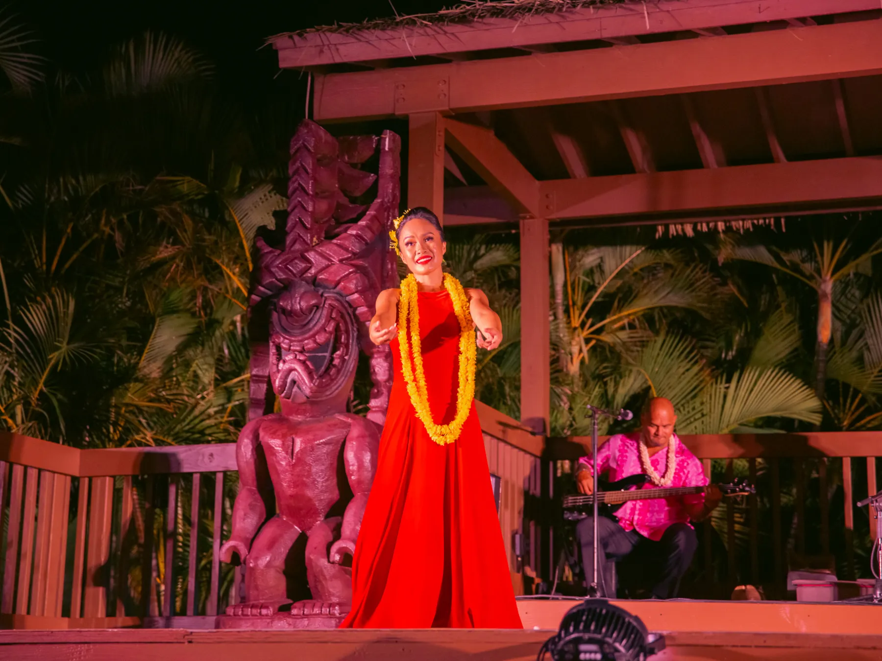 a man and a woman standing in front of a building